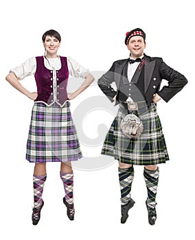 The pair woman and man dancing Scottish dance