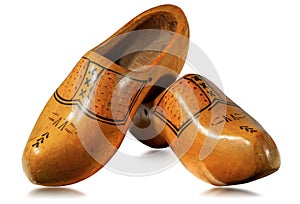 Pair of wooden clogs made in Netherlands isolated on white