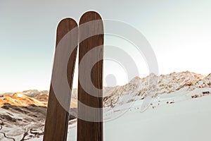 A pair of wooden skis in a morning sun