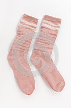 Pair of worn socks isolated on white background