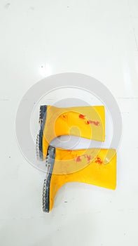 a pair of yellow boots