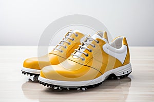 A pair of yellow leather golf shoes on a white background. Generated by artificial intelligence