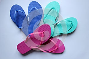 Pairs of beach shoes tong in colors
