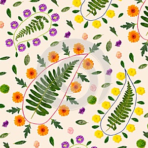 Paisley inspired floral pattern. Arrangement created from fresh colorful natural flowers, green leaves and strings. Top view