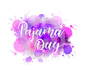 Pajama day letering on watercolor paint splash