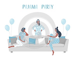 Pajama party. Young women in blue pajamas are sitting on the couch and talking. Blue balloons here. Slumber party