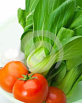 Pakchoi, garlic and tomato photo