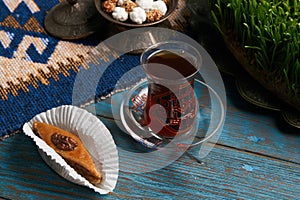 Pakhlava or baklava with glass of black tea