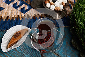 Pakhlava or baklava with glass of black tea