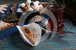 Pakhlava or baklava with glass of black tea