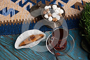 Pakhlava or baklava with glass of black tea