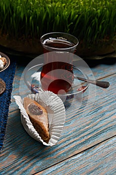 Pakhlava or baklava with glass of black tea