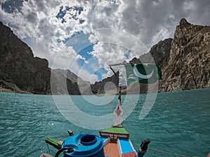 Pakistan Flag On A Boat At Beautiful view of attabad lake Karakoram Highway
