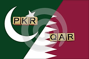 Pakistan and Qatar currencies codes on national flags background