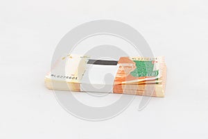 Pakistan twenty rupees banknote bundle on white isolated background