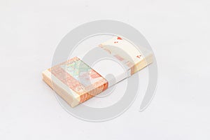 Pakistan twenty rupees denomination note bundle on white isolated background