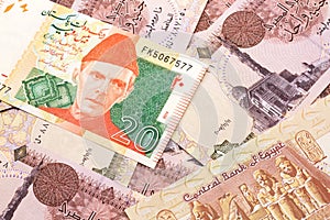 A Pakistani rupee bank note with Egyptian one pound bank notes