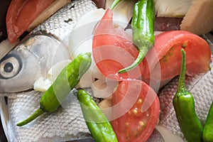 Paksiw na bangus or milkfish in vinegar is a tradional Filipino dish.