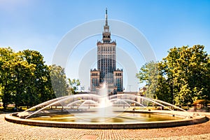 Palace of Culture and Science with Fountain during a Sunny Day in Warsaw