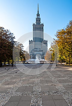 Palace of Culture and Science in Warsaw, Poland. Colorful Autumn Color Park in Foreground