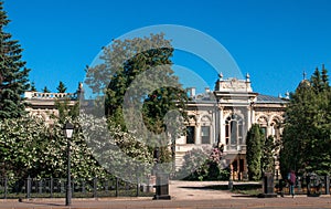 Palace of fine arts city. A beautiful building in Europe. Green trees on the background of the palace