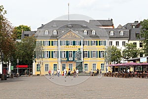 Palace FÃ¼rstenberg and general post office german Hauptpost, Postamt with statue of Ludwig van Beethoven on square MÃ¼nsterplatz