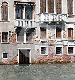 Palace and the gate on the water of Grand Canal in Venice photo