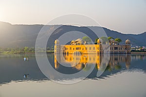 The Palace Jal Mahal Water Palace in the middle of Man Sager Lake at sunrise, Jaipur, India, Asia