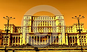 The Palace of the Parliament or People`s House, Bucharest, Romania. Night view from the Central Square.  The Palace was ordered b