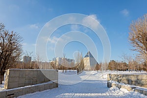 Palace of Peace and Accord. Modern architectural urbanistic city Astana. Futuristic building pyramids on sunny winter