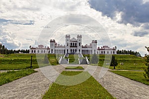 Palace of the Puslovsky in Kosava against the background of the cloudy sky.