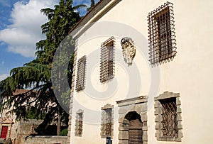 Palace with sturdy bars on the windows in Monselice through the hills in the Veneto (Italy)