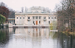 Palace on the Water in Royal Åazienki Park in the autumn fog. O