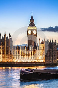 Palace of Westminster and Big Ben sundown view from Thames river