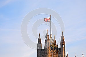 Palace of Westminster and Union Jack flag London England