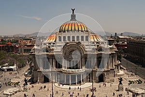 The Palacio de Bellas Artes Palace of the Fine Arts on a sunny and busy day, Mexico City