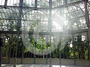 Palacio de Cristal (crystal palace) in retiro park madrid spain photo