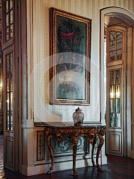 Palacio Nacional de Queluz National Palace. Detail of the interior showing furniture, painting and decoration. photo