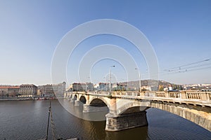Palacky bridge, also called Palackeho Most, in Prague, Czech Republic, over the Vltava river, with a view of the Smichov and Andel photo