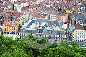 Palais du parlement du Dauphine in Grenoble, seen from the Bastilla mountain, France photo