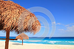 Palapa sun roof beach umbrella in caribbean photo