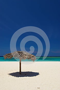 Palapas on Holguin beach in Cuba