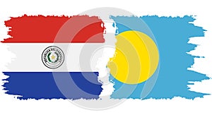 Palau and Paraguay grunge flags connection vector