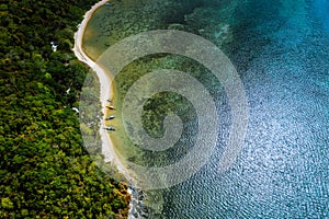 Palawan, Philippines, El Nido. Aerial drone above view of a secluded deserted tropical beach with local traditional