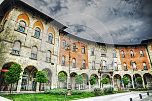Palazzo della Provincia under a cloudy sky in Pisa photo