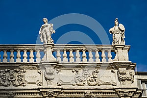 Palazzo Maffei with statues of divinities at Piazza delle Erbe in Verona, Italy