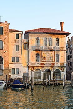 The Palazzo Salviati with its unmissable 1924 mosaic on Venice\'s main waterway. Venice, Italy photo