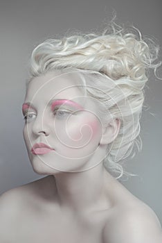 Pale beauty portrait of blond woman photo