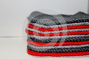 A pale of bright knitted elements