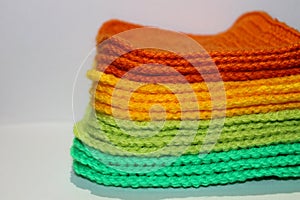 A pale of bright knitted elements